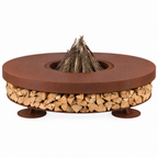 Round outdoor fire pit table with a rusted brown metal top and base, filled with wood logs, on a white background.